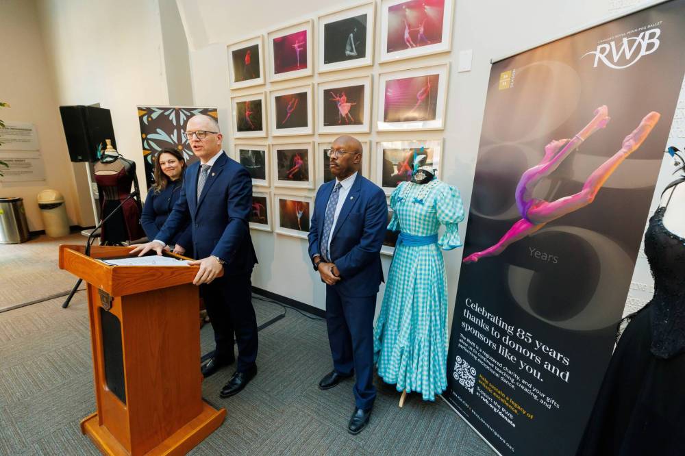 MIKE DEAL / FREE PRESS
Winnipeg Mayor Scott Gillingham (centre), flanked by councillors Sherri Rollins and Markus Chambers, announced new funding for downtown arts groups on Wednesday.