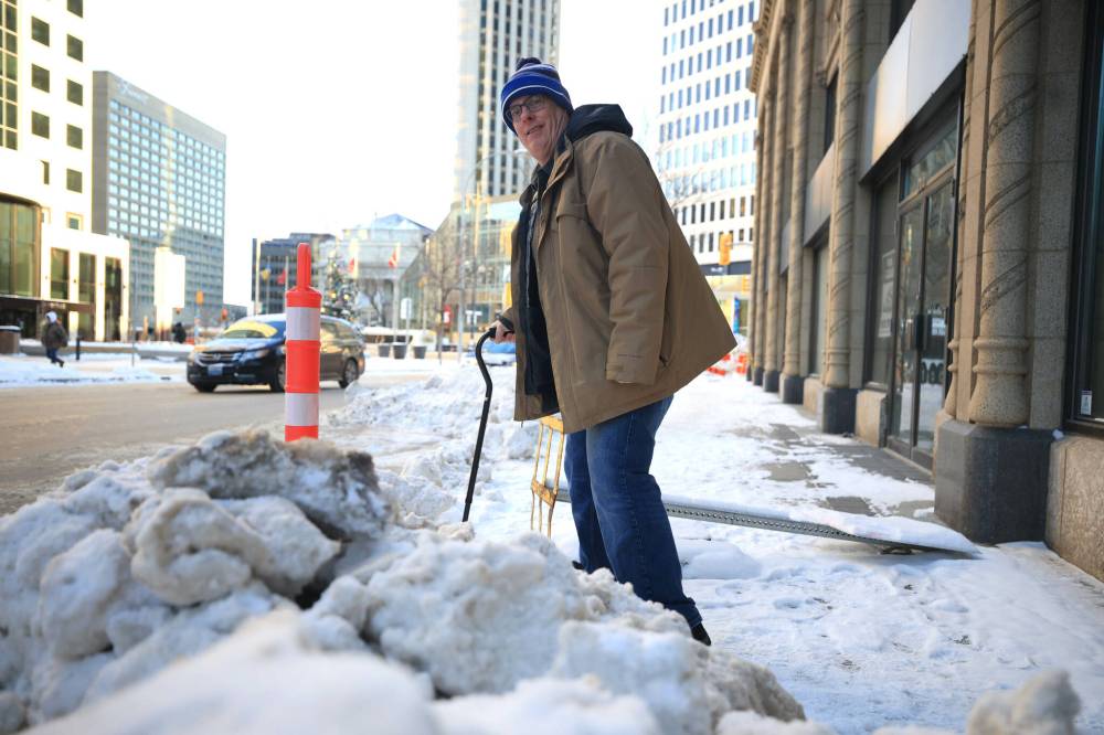 RUTH BONNEVILLE / FREE PRESS FILES
David Kron, executive director of the Cerebral Palsy Association of Manitoba, was concerned even a temporary snow-clearing change would have forced more people to stay home more often.