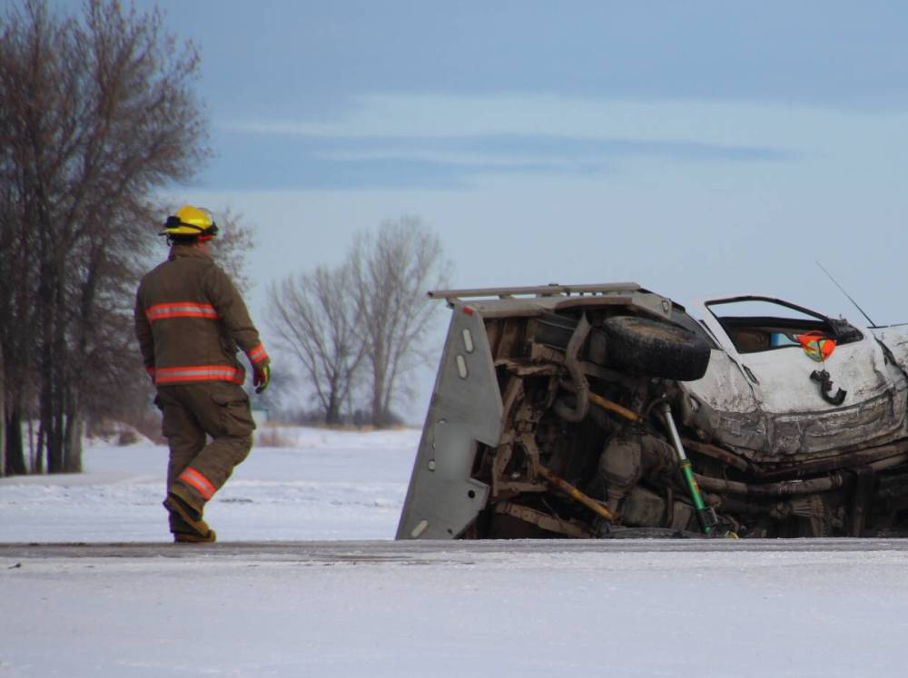 Michael Blume / PortageOnline News
Emergency crews at a three-vehicle crash involving a stolen truck on Highway 26, near Portage la Prairie, Wednesday morning. A 28-year-old woman driving an SUV, a High Bluff resident, was pronounced dead at the scene.