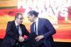 Manitoba Premier Wab Kinew (right) with Ron Kostychyn, Minister of Agriculture, after speaking during the dignitaries’ address at Manitoba Ag Days on Tuesday. (Tim Smith / The Brandon Sun)