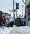 SUPPLIED
                                Fire crews work the scene of a vehicle collision at Goodies Bake Shop on the corner of Ellice Avenue and Erin Street Friday morning.