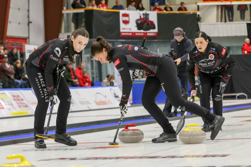 From left: third Taylor McDonald, lead Mackenzie Elias and skip Kate Cameron of Team Cameron defeated Beth Peterson’s team. (Connie Laliberte photo)