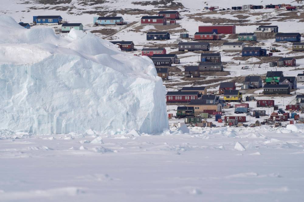 Bonnie Jo Mount / The Washington Post
In Qaanaaq, Greenland, residents live between the gargantuan Greenland ice sheet and the frigid waters of Baffin Bay. They are also pawns in U.S. President Donald Trump’s proposed North American power play for territory.