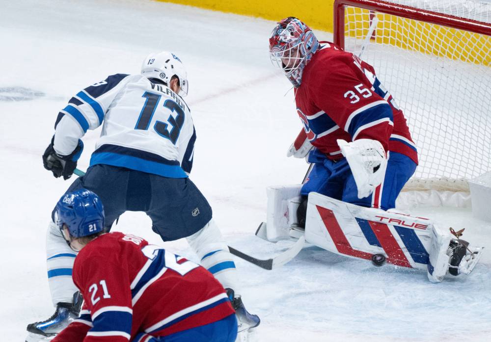 Christinne Muschi / THE CANADIAN PRESS
Canadiens goaltender Sam Montembeault stops a shot by Jets’ Gabriel Vilardi during the first period.