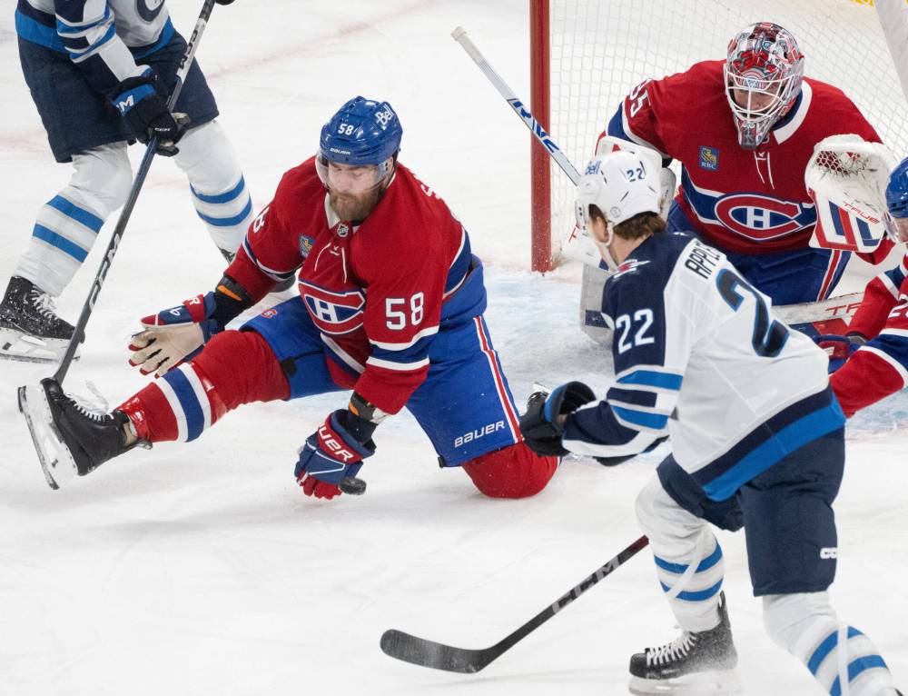 Christinne Muschi / THE CANADIAN PRESS
Canadiens’ David Savard stops a shot by Winnipeg Jets’ Mason Appleton during the first period.