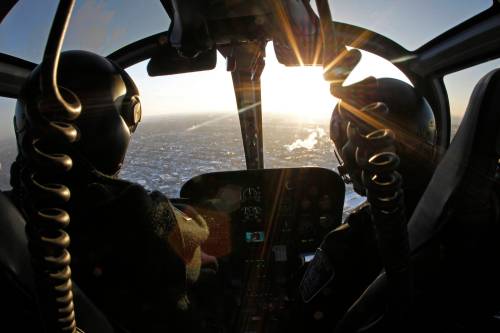 TREVOR HAGAN / FREE PRESS FILES
                                 Const. Nick Paulet and pilot Renee Brindeau fly the Winnipeg Police Service&rsquo;s helicopter in this file photo. WPS credits its existing helicopter for safely ending high-speed chases, finding missing people and helping locate potentially dangerous suspects.