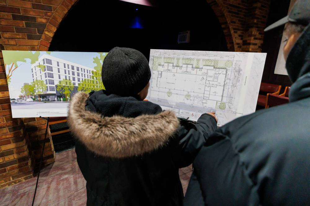MIKE DEAL / FREE PRESS
Valerie Beardy was one of many people at an open house Thursday who are interested in the potential new apartment development that would be in the parking lot for the Sherbrook Inn.