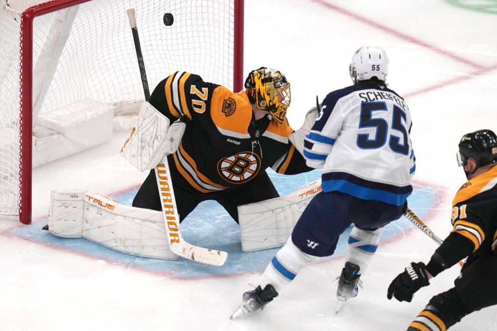 Charles Krupa / The Associated Press
Winnipeg Jets centre Mark Scheifele scores a power-play goal Thursday during third-period action against the Boston Bruins.