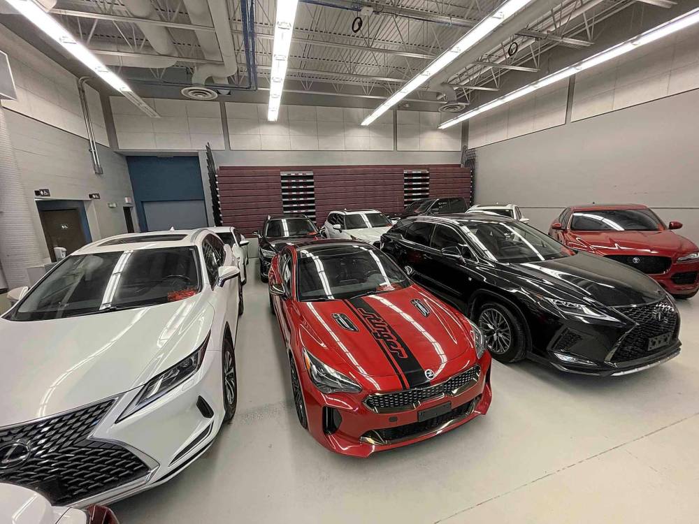 MIKE DEAL / FREE PRESS
The stolen vehicles were meant to appear as though they were properly owned by and then sold by one person to dealerships, through online platforms and out of a business.