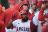 FILE - Los Angeles Angels' Luis Rengifo is congratulated for his two-run home run against the Detroit Tigers during the first inning, June 28, 2024, in Anaheim, Calif. (AP Photo/Ryan Sun, File)