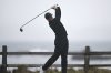 Rory McIlroy, of Northern Ireland, hits his tee shot on the 18th hole at Pebble Beach Golf Links during the third round of the AT&T Pebble Beach Pro-Am golf tournament, Saturday, Feb. 1, 2025, in Pebble Beach, Calif. (AP Photo/Nic Coury)