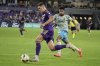 Orlando City's Luca Petrasso, left, moves the ball toward the goal past Philadelphia Union's Nathan Harriel during the second half of an MLS soccer match, Wednesday, Oct. 2, 2024, in Orlando, Fla. CF Montréal announced Friday that it has added Canadian defender Petrasso and American defender Brandan Craig. Both players are signed through 2025, with options for 2026 and 2027 on Petrasso's deal and an additional option year for Craig. THE CANADIAN PRESS/AP/John Raoux