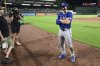 FILE - Texas Rangers' Wyatt Langford does post-game interview following a baseball game against the Baltimore Orioles, Sunday, June 30, 2024, in Baltimore. (AP Photo/Nick Wass, File)