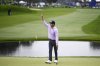 Harris English celebrates after winning the Farmers Insurance Open golf tournament at Torrey Pines Saturday, Jan. 25, 2025, in San Diego. (AP Photo/Denis Poroy)