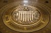 FILE- The seal of the Board of Governors of the United States Federal Reserve System is displayed in the ground at the Marriner S. Eccles Federal Reserve Board Building in Washington, Feb. 5, 2018. (AP Photo/Andrew Harnik, File)