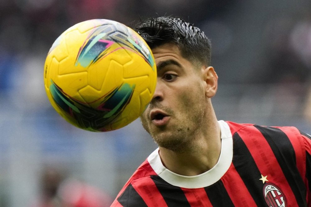 AC Milan's Alvaro Morata makes an attempt to score during a Serie A soccer match between AC Milan and Parma, at the San Siro stadium in Milan, Italy, Sunday, Jan. 26, 2025. (AP Photo/Luca Bruno)