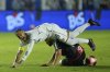 Brazil's Neymar is fouled by Botafogo-SP's Alisson Cassiano during his debut match for Santos FC, in a Sao Paulo league soccer match, in Santos, Brazil, Wednesday, Feb. 5, 2025. (AP Photo/Andre Penner)
