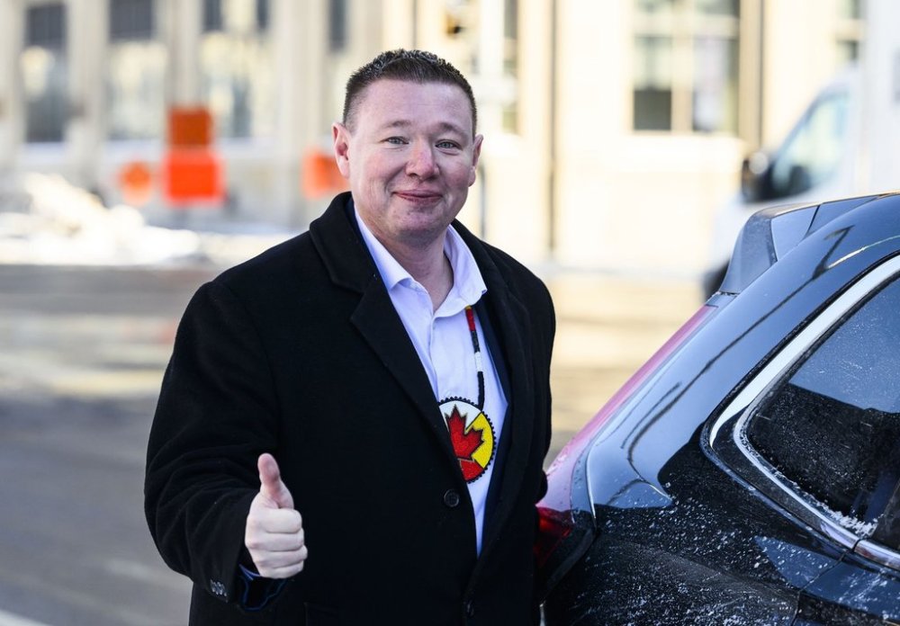 Liberal MP Jaime Battiste, then-candidate for the leadership of the Liberal Party of Canada, gives a thumbs up as he makes his way to his vehicle in Ottawa, on Friday, Jan. 24, 2025. THE CANADIAN PRESS/Justin Tang