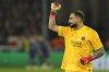 PSG's goalkeeper Gianluigi Donnarumma celebrates after PSG's Ousmane Dembele scoring his side's third goal during the Champions League opening phase soccer match between Stuttgart and Paris Saint-Germain at the Stuttgart Arena in Stuttgart, Germany, Wednesday, Jan. 29, 2025. (AP Photo/Michael Probst)