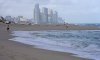Snowbirds are scrambling to sell their homes in Florida as a weak loonie and high insurance costs drive a Canadian exodus from the sunshine state. People walk along the beach in Surfside, Fla. on Tuesday, Dec. 17, 2024. THE CANADIAN PRESS/AP/Lynne Sladky