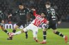 Liverpool's Wataru Endo, left, and PSV's Ricardo Pepi fight for the ball during the Champions League opening phase soccer match between PSV and Liverpool at Phillips Stadium in Eindhoven, Netherlands, Wednesday, Jan. 29, 2025. (AP Photo/Peter Dejong)
