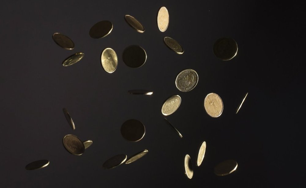 The Canadian dollar plunged to its lowest level since 2003 amid threats of a trade war with the United States. Canadian dollar coins are pictured in North Vancouver, Wednesday, May 29, 2019. THE CANADIAN PRESS/Jonathan Hayward