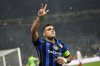 Inter Milan's Lautaro Martinez flashes up his three fingers as he's celebrates his third goal against Monaco during a Champions League opening phase soccer match between Inter Milan and Monaco, at the San Siro stadium in Milan, Italy, Wednesday, Jan. 29, 2025. (AP Photo/Luca Bruno)