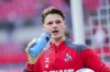 Cologne goalkeeper Jonas Urbig warms up ahead of the Bundesliga 2 soccer match between FC Koln and SV Elversberg, at the RheinEnergieStadion in Cologne, Germany, Saturday Jan. 25, 2025. (Rolf Vennenbernd/dpa via AP)