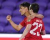 Canada midfielder Theo Corbeanu, left, celebrates his goal against Bermuda with forward Liam Millar (23) during the second half of a World Cup 2022 Group B qualifying soccer match Thursday, March 25, 2021, in Orlando, Fla. THE CANADIAN PRESS/AP-John Raoux