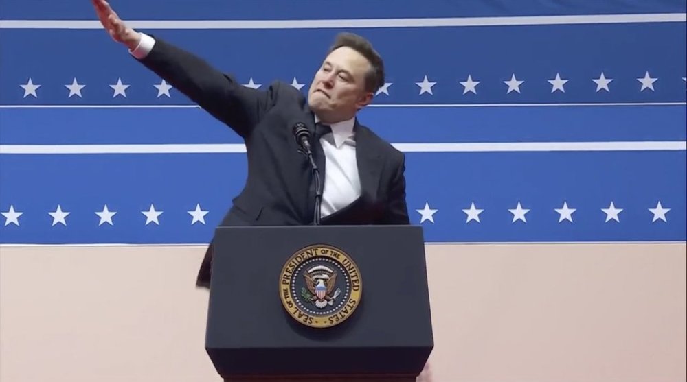 Elon Musk gestures while speaking at an indoor Presidential Inauguration parade event in Washington, Monday, Jan. 20, 2025. THE CANADIAN PRESS/AP Photo