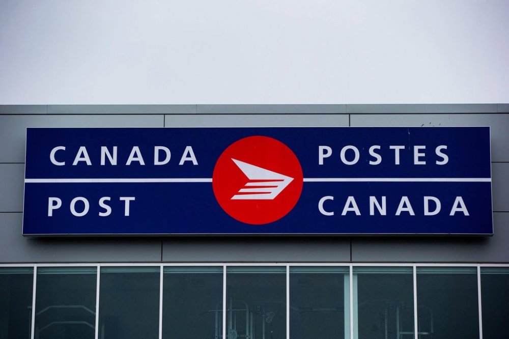 The Canada Post logo is seen on the outside the company's Pacific Processing Centre, in Richmond, B.C., on Thursday June 1, 2017. THE CANADIAN PRESS/Darryl Dyck