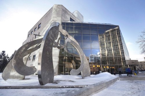 People enter the Law Courts in Winnipeg on Monday, Feb. 5, 2018. THE CANADIAN PRESS/John Woods