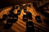 FILE - Traffic flows on Interstate 435 on Sept. 25, 2024, in Leawood, Kan. (AP Photo/Charlie Riedel, File)
