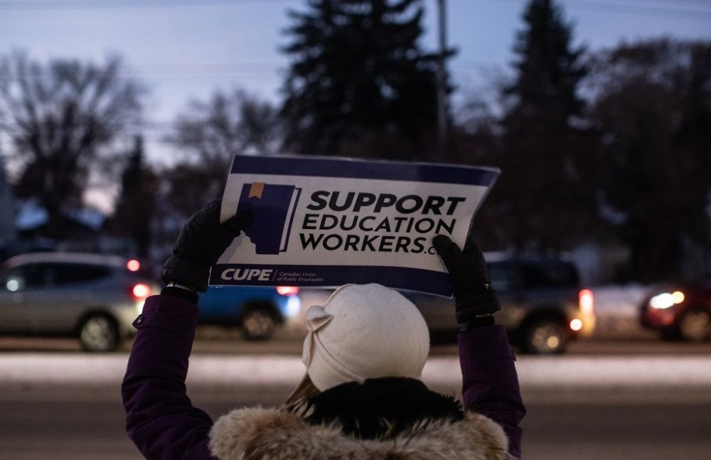 The public school board employing thousands of striking school support workers says the union representing them has left the bargaining table. Union members and supporters picket for better education funding, and more classroom support in Edmonton, on Monday, Jan. 13, 2025.THE CANADIAN PRESS/Jason Franson