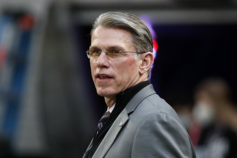 FILE - Minnesota Vikings general manager Rick Spielman stands on the field before an NFL football game against the Chicago Bears, in Minneapolis, Jan. 9, 2022. (AP Photo/Bruce Kluckhohn, File)