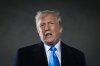 United States President Donald Trump speaks to reporters next to Air Force 1 after arriving back at Joint Base Andrews, Md., Sunday, Feb. 2, 2025. THE CANADIAN PRESS/AP/Ben Curtis