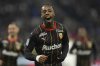 FILE - Lens' Elye Wahi celebrates after scoring his side' second goal during the French League One soccer match between Lyon and Lens at the Groupama stadium, outside Lyon, France, Sunday, March 3, 2024. (AP Photo/Laurent Cipriani, File)