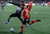 Cavalry FC's Sergio Camargo attempts a shot on net as Pumas UNAM's Ricardo Galindo tries to steal the ball way during first half soccer action in round one of the 2025 CONCACAF Champions Cup in Langford, B.C., on Thursday, February 6, 2025. THE CANADIAN PRESS/Chad Hipolito
