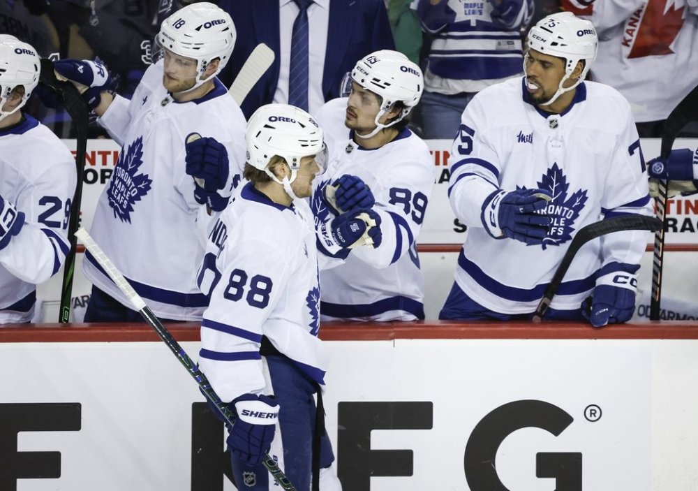 Toronto Maple Leafs' William Nylander (88) celebrates his goal with teammates during second period NHL hockey action against the Calgary Flames in Calgary on Tuesday, Feb. 4, 2025.THE CANADIAN PRESS/Jeff McIntosh