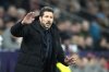 Atletico Madrid's head coach Diego Simeone gives directions to his players during the Champions League opening phase soccer match between FC Salzburg and Atletico Madrid at the Salzburg Arena in Salzburg, Austria, Wednesday, Jan. 29, 2025. (AP Photo/Matthias Schrader)