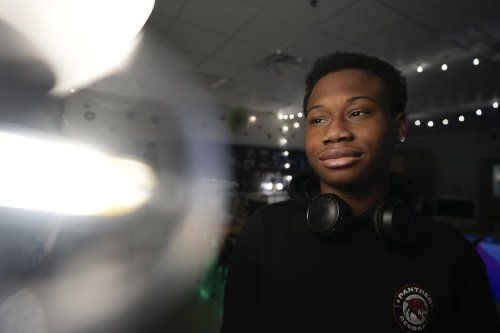 D. M. Therrell High School student Ja'Marion Hulin, 17, who runs the school's record company, Panther Records, poses for a photograph Monday, Jan. 27, 2025, in Atlanta. (AP Photo/Brynn Anderson)