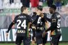 Venezia's Alessio Zerbin, left, celebrates after scoring the opening goal during the Serie A soccer match between Venezia and Hellas Verona in Venice, Italy, Monday, Jan. 27, 20245. (Paola Garbuio/LaPresse via AP)