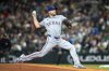 FILE - Texas Rangers starter Max Scherzer delivers a pitch during a baseball game against the Seattle Mariners, Sept. 14, 2024, in Seattle. (AP Photo/Stephen Brashear, File)