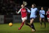Arsenal's Stina Blackstenius, left, and Manchester City's Rebecca Knaak battle for the ball during the Women's League Cup semi-final soccer match between Arsenal and Manchester City, at Meadow Park, Borehamwood, England, Thursday Feb. 6, 2025. (John Walton/PA via AP)