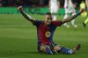 Barcelona's Raphinha celebrates after Fermin Lopez, not in the picture, scored his side's fifth goal during the Spanish La Liga soccer match between Barcelona and Valencia at the Lluis Companys Olympic Stadium in Barcelona, Spain, Sunday, Jan. 26, 2025. (AP Photo/Joan Monfort)