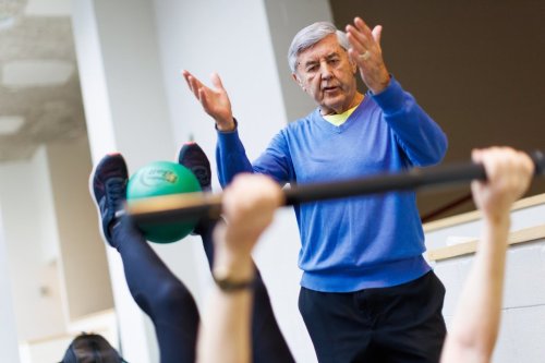Personal trainer Bob Bursach, 82, works with his client, Miriam Varadi during a fitness session in Toronto on Friday, January 24, 2025. THE CANADIAN PRESS/Cole Burston