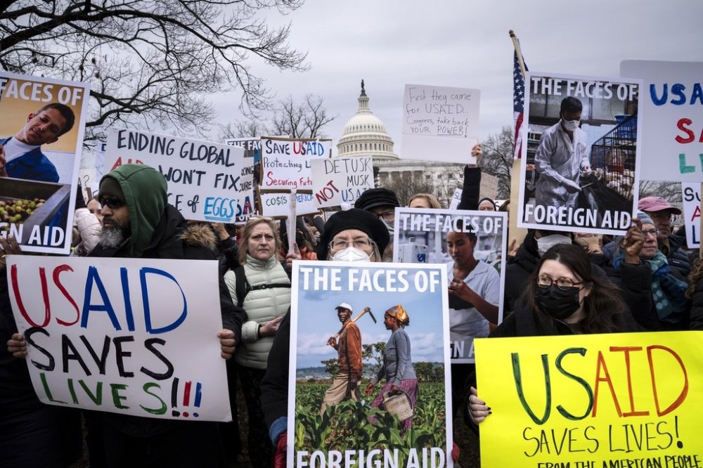 Demonstrators and lawmakers rally against President Donald Trump and his ally Elon Musk as they disrupt the federal government, including dismantling the U.S. Agency for International Development, which administers foreign aid approved by Congress, on Capitol Hill in Washington, Wednesday, Feb. 5, 2025. THE CANADIAN PRESS/AP, J. Scott Applewhite