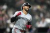 FILE - Minnesota Twins' Carlos Correa celebrates after his home run off Chicago White Sox relief pitcher Jordan Leasure during the seventh inning of a baseball game Monday, July 8, 2024, in Chicago. (AP Photo/Charles Rex Arbogast, File)