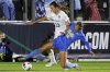 FILE - North Carolina's Isabel Coxs (13) and UCLA's Quincy McMahon (19) battle for a ball during the second half of the NCAA women's soccer tournament final in Cary, N.C., Monday, Dec. 5, 2022. (AP Photo/Ben McKeown, File)