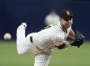 FILE - San Diego Padres starting pitcher Michael King works against a Houston Astros batter during the first inning of a baseball game Sept. 17, 2024, in San Diego. (AP Photo/Gregory Bull, File)